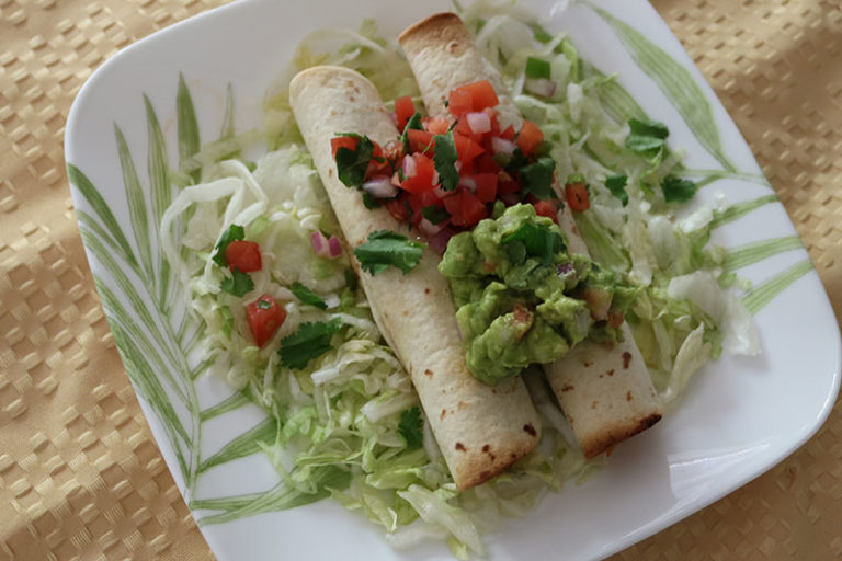 Baked Chicken Taquitos Recipe in the Slow Cooker - Busy Loving Life
